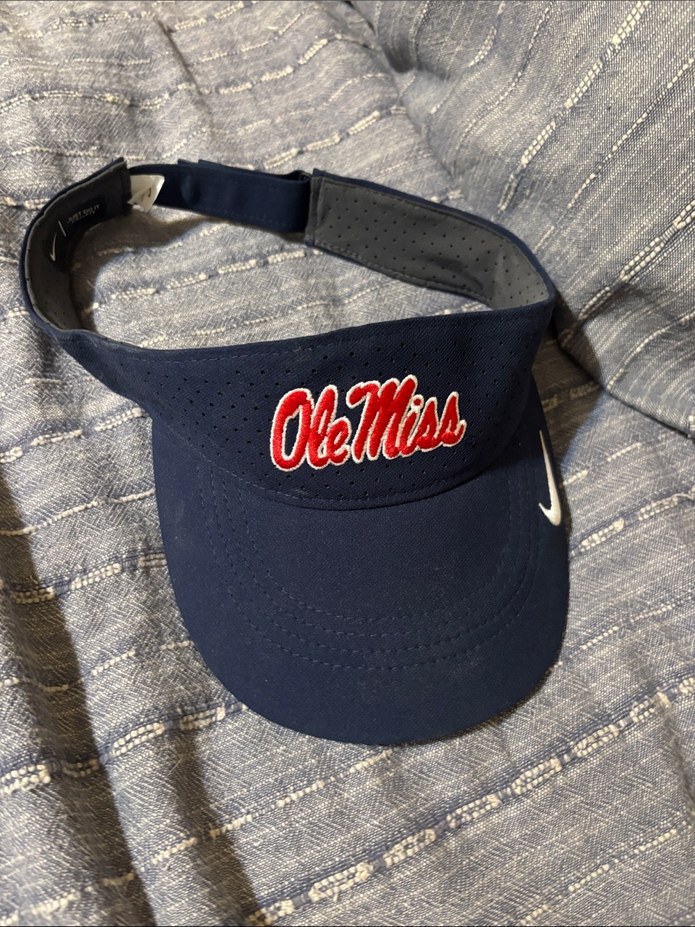Nike Navy Visor with Red Ole Miss Script and White Swoosh